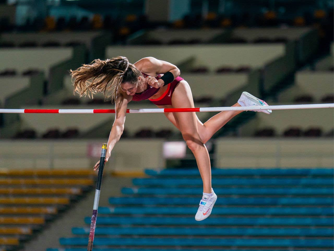 Pole Vault Mid Jump Action Shot